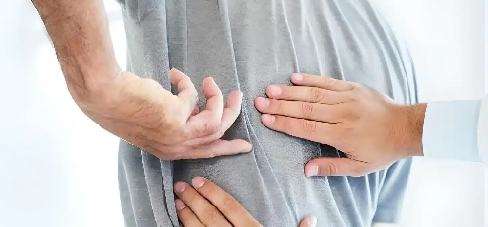paciente con dolor en la espalda